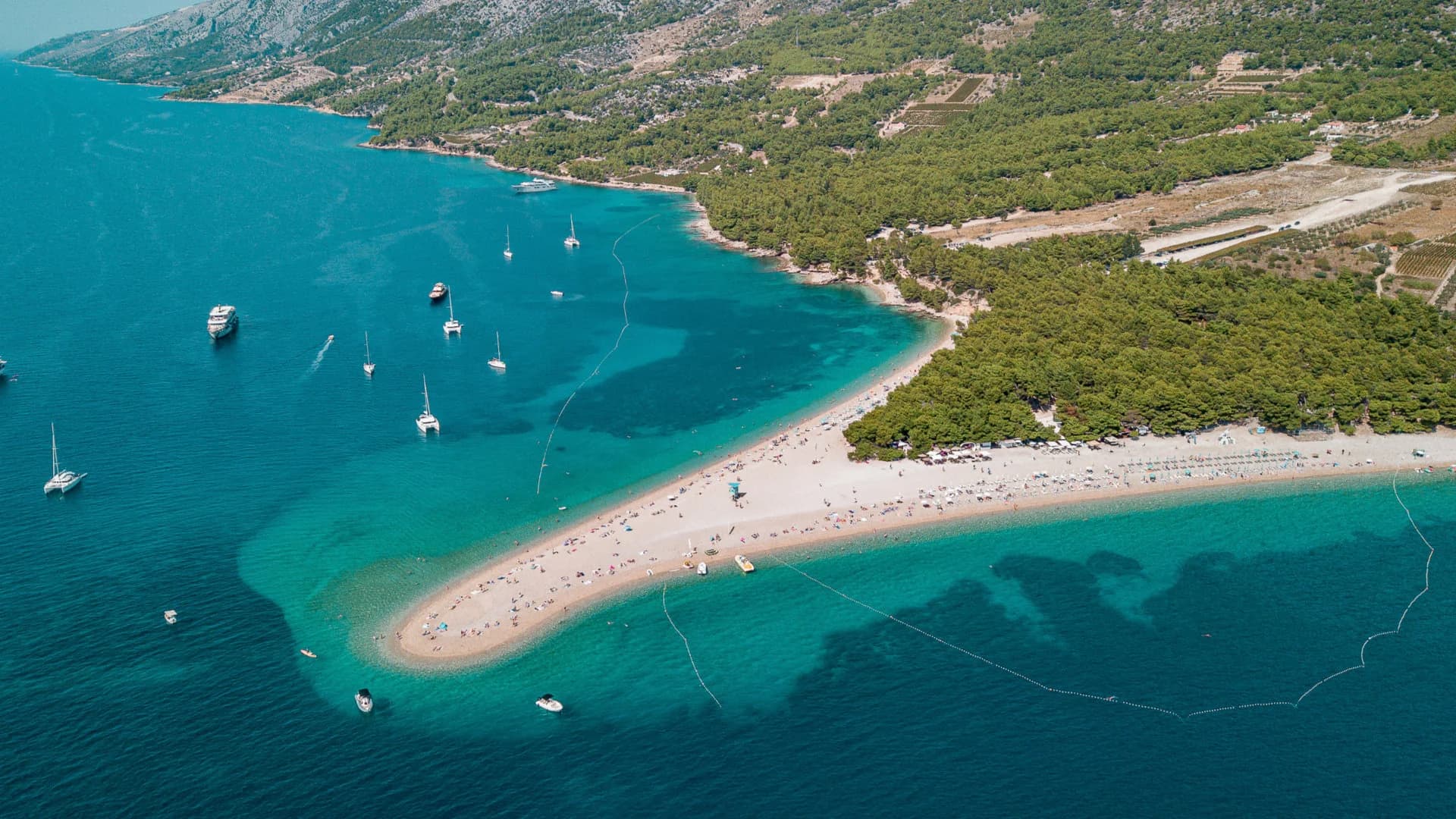 Zlatni Rat, the Golden Cape, its pebble spit curving into the sea off Bol on Brač — Golden Cape, Hvar & Pakleni Islands