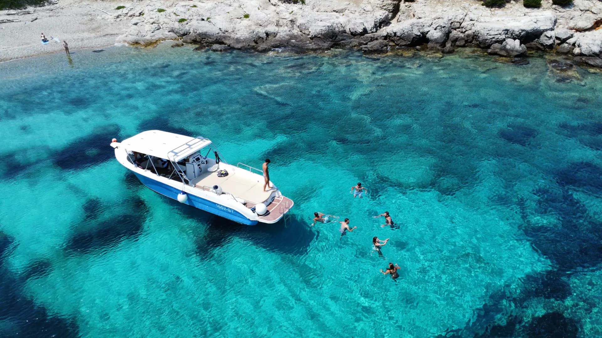 The Drvenik Blue Lagoon from the air, turquoise water over white sand — Blue Lagoon & Trogir — Half Day